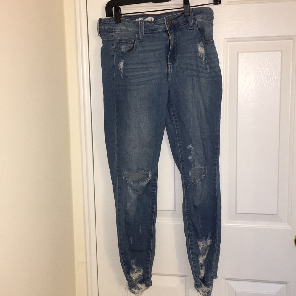 Light blue ripped jeans